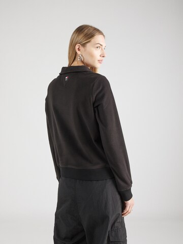 Pull-over Tommy Jeans en noir