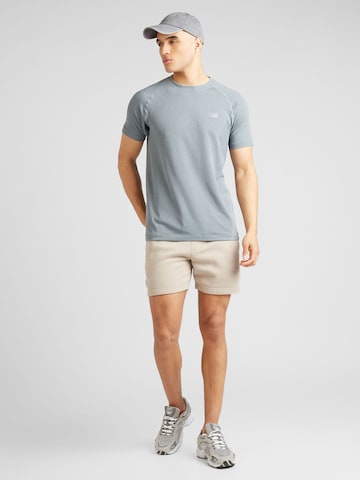 new balance - Camiseta funcional en gris
