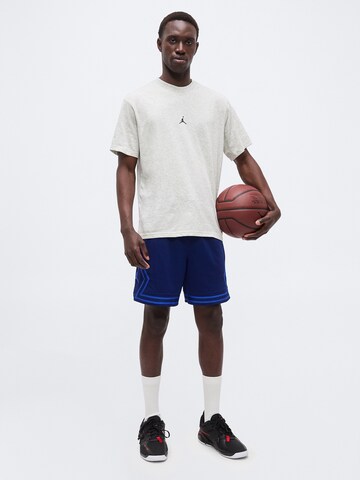 T-Shirt fonctionnel Jordan en gris
