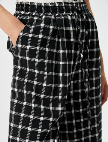 Koton Wide Leg Hose in Schwarz