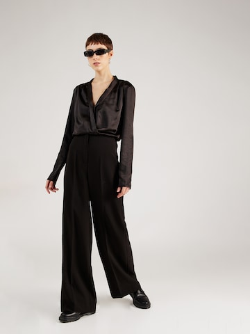 SOAKED IN LUXURY Wide leg Pantalon 'Corinne' in Zwart