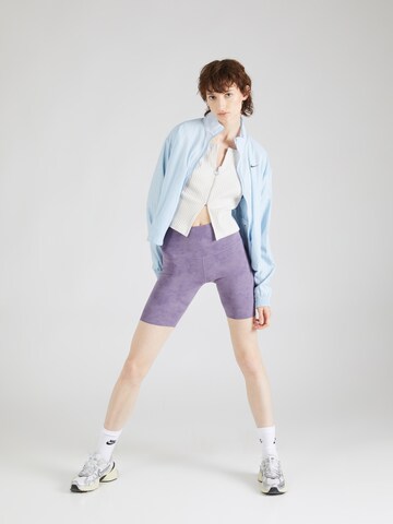 NIKE Szabványos Sportnadrágok - lila