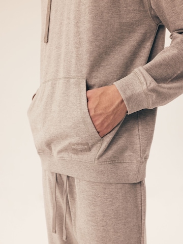 Felpa 'Kapuzensweatshirt Motion, French Terry, mit Rippbündchen' di Henderson in grigio