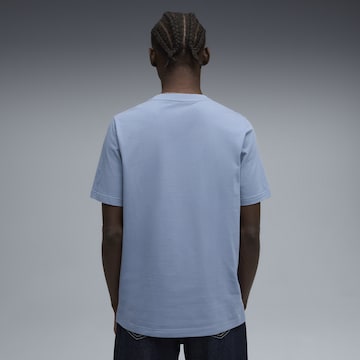 PUMA Shirt 'Wardrobe Ess' in Blauw