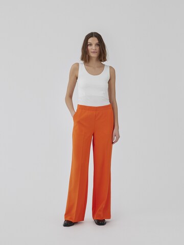 modström Wide leg Trousers with creases 'Nelli' in Orange