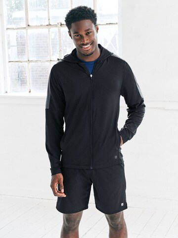 Next Treenitakki värissä musta: etupuoli