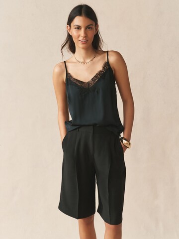 Loosefit Pantaloni con pieghe di Next in nero