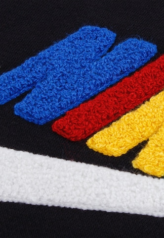 Nike Sportswear - Ropa para correr 'FUTURA' en negro