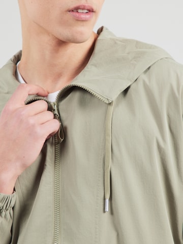 ABOUT YOU Välikausitakki 'Jesper' värissä vihreä