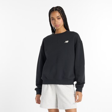 Sweat-shirt new balance en noir : devant