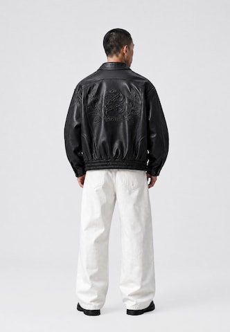 Veste mi-saison Vertere Berlin en noir : derrière