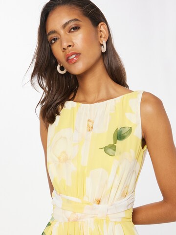 SWING Cocktail dress in Yellow