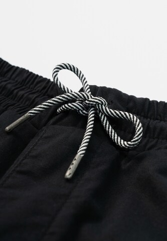 recolution Tapered Chinohose in Schwarz