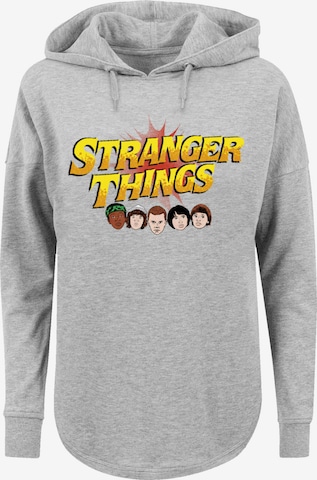 Sweat-shirt 'Stranger Things Comic Heads Netflix TV Series' F4NT4STIC en gris : devant