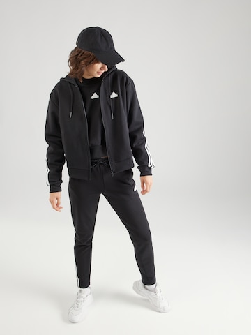 ADIDAS SPORTSWEAR Urheilullinen collegetakki värissä musta