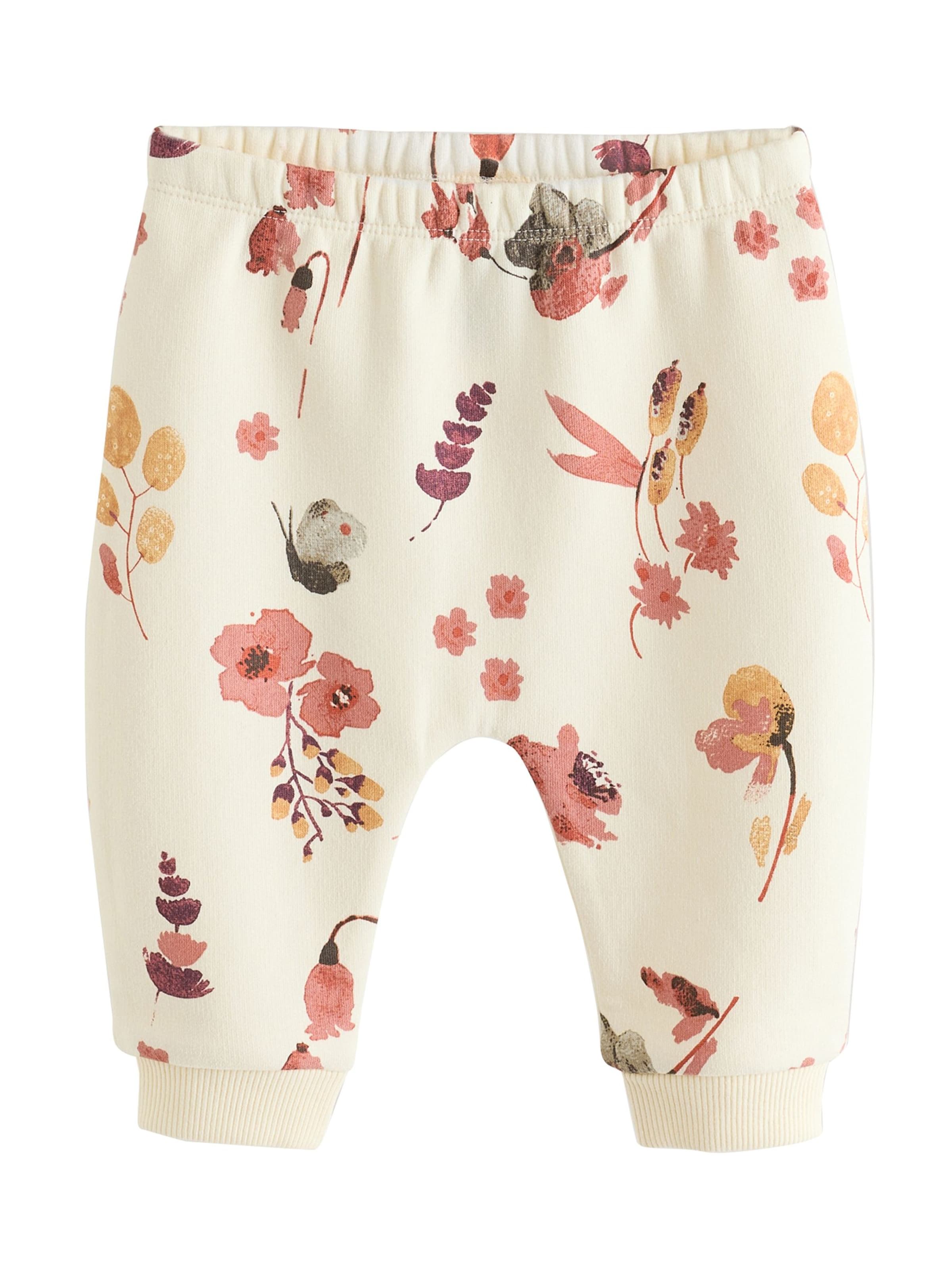 Next - Ropa para correr en blanco