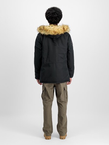 ALPHA INDUSTRIES Vinterparkas 'Explorer' i svart