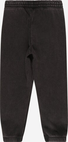 Nike Sportswear Tapered Pants in Black