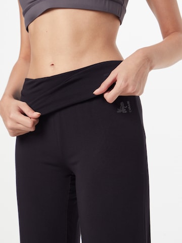Regular Pantaloni sport de la CURARE Yogawear pe negru