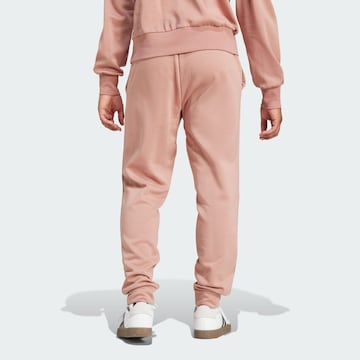 ADIDAS SPORTSWEAR Tapered Workout Pants 'Essentials Feelcozy' in Pink