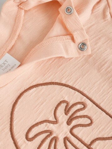 Set Next en orange