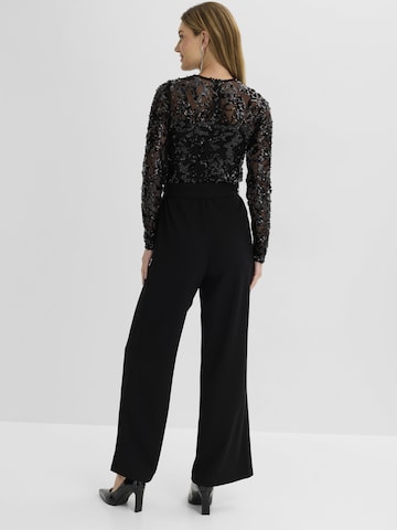 Tuta jumpsuit di bonprix in nero