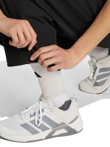 ADIDAS PERFORMANCE Tapered Sports trousers in Black