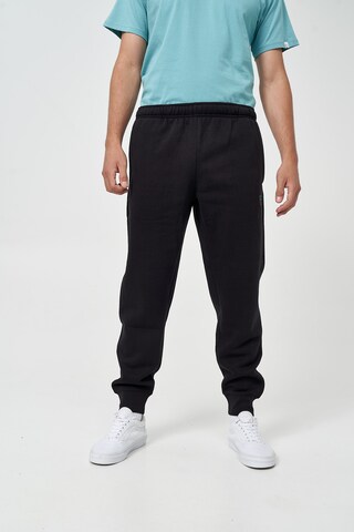 Mikon Tapered Broek 'Palme' in Zwart: voorkant