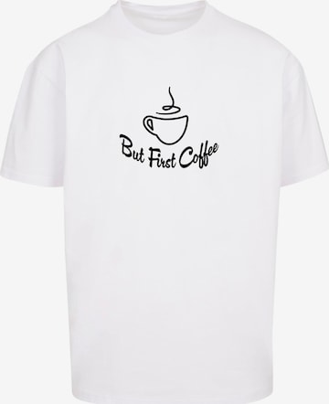 Merchcode T-Shirt 'But First Coffee' in Weiß: predná strana