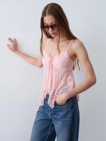 Top di Dilvin in rosa