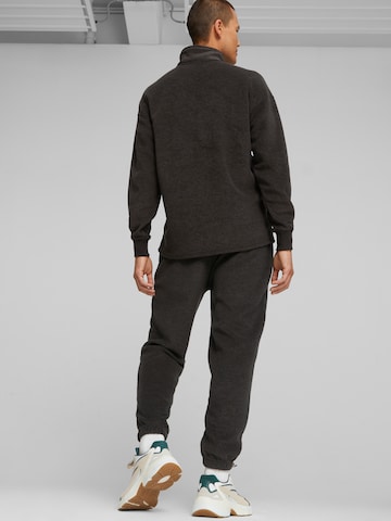 PUMA - Tapered Pantalón en negro