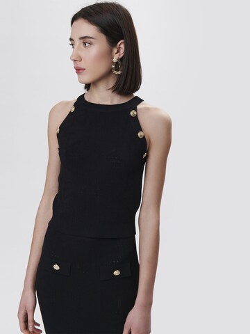 Influencer Stricktop in Schwarz: Vorderseite