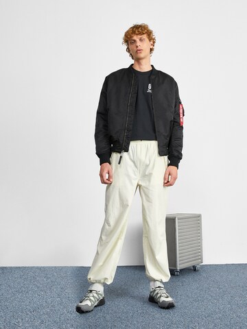 ALPHA INDUSTRIES - Casaco meia-estação 'Dragon' em preto