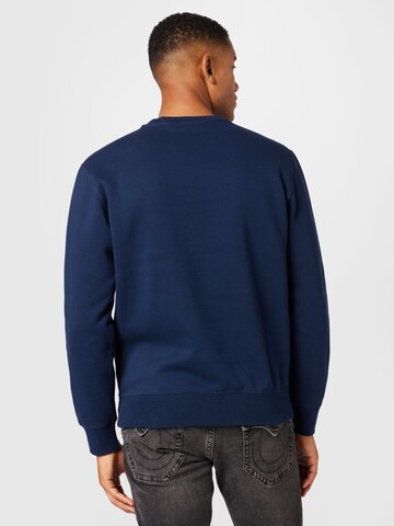 Champion Authentic Athletic Apparel Sweatshirt i blå