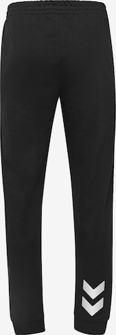 Effilé Pantalon de sport Hummel en noir