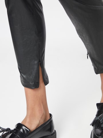 GUESS Skinny Leggings in Schwarz