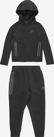 Nike Sportswear Trenirka za tek 'TECH FLEECE' | črna barva: sprednja stran