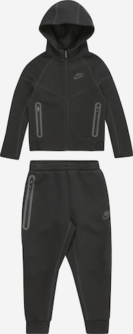 Nike Sportswear Joggingpak 'TECH FLEECE' in Zwart: voorkant