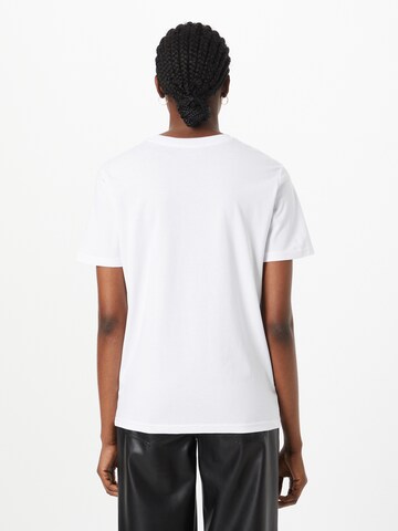 T-shirt Vintage Supply en blanc