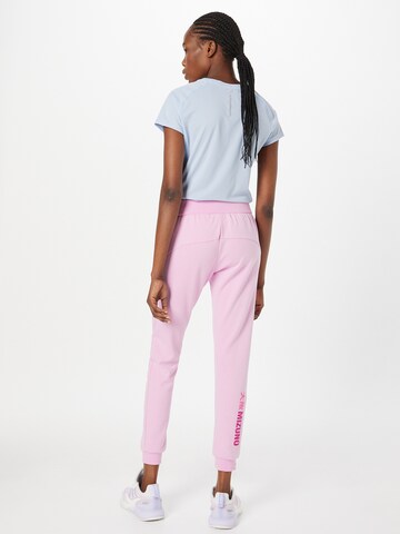 Effilé Pantalon de sport 'Athletic' MIZUNO en rose