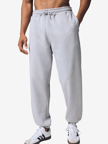 Next Tapered Trousers in Grey: front