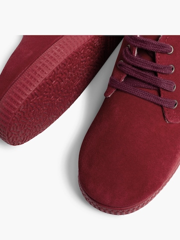 Pisamonas - Bota em vermelho