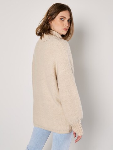 Pull-over ' ' Apricot en gris