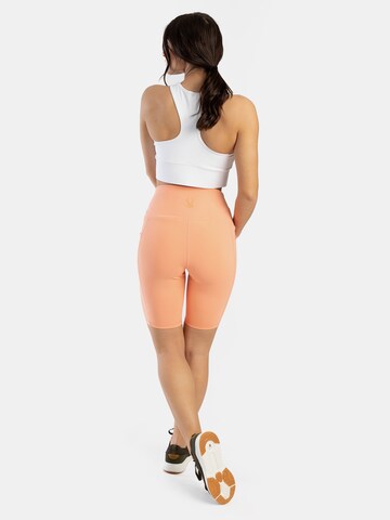 Skinny Pantaloni sportivi di Spyder in arancione