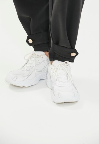 Athlecia Loosefit Sporthose 'Nikoni' in Schwarz