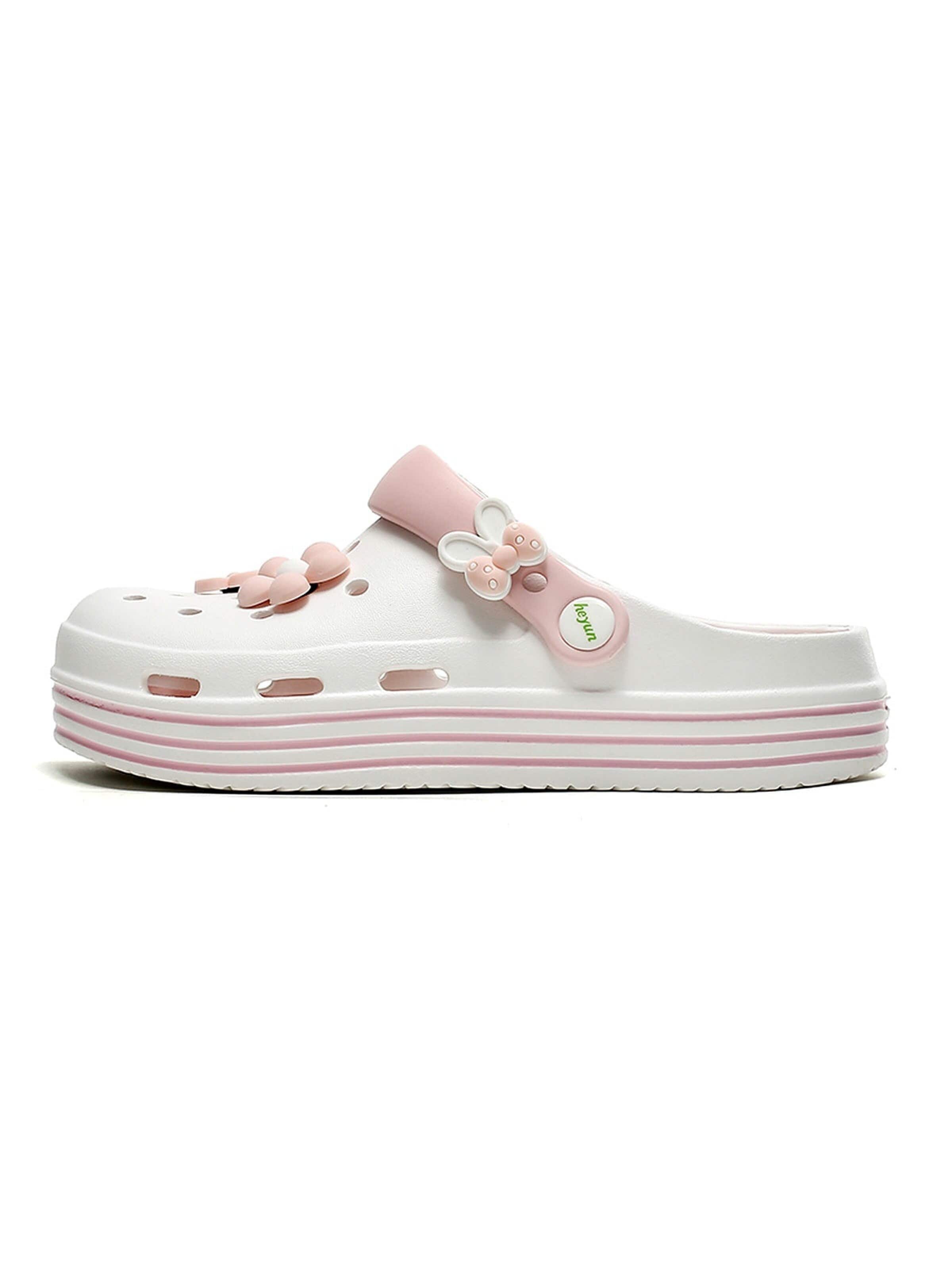 HUSKSWARE Clogs in White: front
