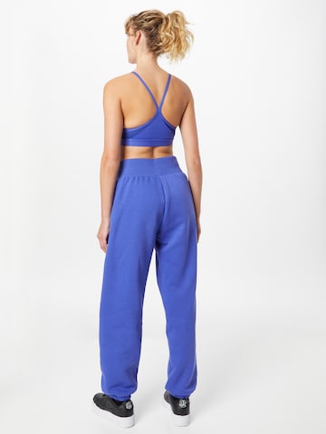 Nike Sportswear Tapered Παντελόνι 'Phoenix Fleece' σε μπλε
