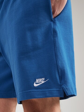 Nike Sportswear Lużny krój Spodnie 'Club' w kolorze niebieski