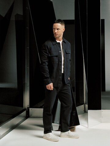 DAN FOX APPAREL Tapered Trousers with creases 'Elian' in Blue