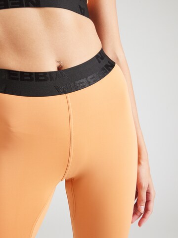 NEBBIA Skinny Spodnie sportowe w kolorze pomarańczowy